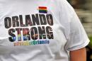 An Orlando resident wears an "Orlando Strong" T-shirt during a vigil at Lake Eola Park for victims of an early morning shooting attack at a gay nightclub in Orlando