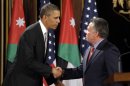U.S. President Barack Obama, left, and Jordan's King Abdullah II, right, shake hands following their joint new conference at the King's Palace in Amman, Jordan, Friday, March 22, 2013. (AP Photo/Pablo Martinez Monsivais)
