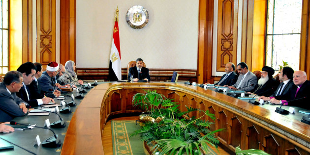 Egyptian Presidency, Egyptian President Mohammed Morsi, center, meets with politicians