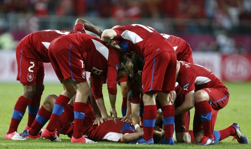 Czech Republic's Jiracek is congratulated by his team mates for a goal during their Group A Euro 2012 soccer match against Poland at City stadium in Wroclaw