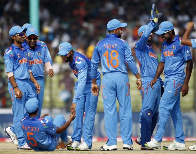 India&#39;s fielders celebrate dismissal of Bangladesh&#39;s Rahman during Asia Cup 2014 ODI cricket match in Fatullah