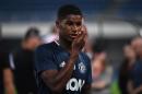 Manchester United's Marcus Rashford walks off after a training session a day before the 2016 International Champions Cup football match between Manchester City and Manchester United, in Beijing on July 24, 2016