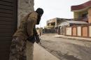 Iraqi forces are battling jihadists deep inside Mosul, edging closer to the River Tigris that divides the city