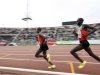 Wilson Kiprop of Kenya races against compatriot Matthew Kisorio during the 10,000m men's final race at the 2010 African Athletics Championship at the Nyayo stadium in the capital Nairobi