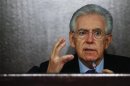Italian caretaker Prime Minister Monti gestures during an end of the year news conference in Rome