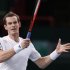 Murray of Britain returns the ball to Poland's Janowicz during the Paris Masters tennis tournament in Paris