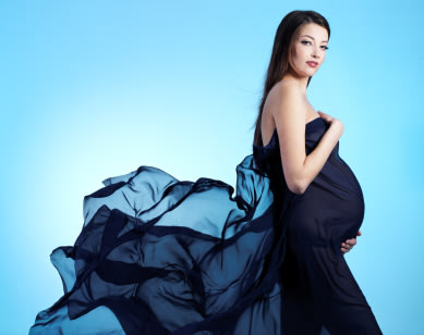 Embarazada! 10 consejos para vestirse de fiesta IStock_000016087557XSmall