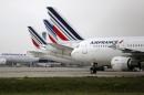 Air France planes are parked on the tarmac at the Charles de Gaulle International Airport in Roissy, near Paris on the second week of a strike by Air France pilots