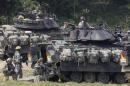 U.S. Army soldiers and its M2A2 Bradley fighting vehicles take part in the U.S.-South Korea joint military exercise against possible attacks by North Korea, at a shooting range near the demilitarized zone separating the two Koreas in Paju