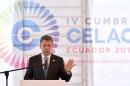 Colombian President Juan Manuel Santos speaks during the CELAC summit in Quito on January 27, 2016