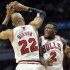 Chicago Bulls' Taj Gibson (22) and Nate Robinson (2) celebrate a basket against the Brooklyn Nets during the second overtime in Game 4 of their first-round NBA basketball playoff series Saturday, April 27, 2013, in Chicago. The Bulls won 142-134 in three overtimes. (AP Photo/Jim Prisching)