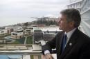 U.S. Congressman, Rep. Michael McCaul, Chairman of the House Homeland Security Committee, stands of a balcony of his hotel which overlooks the Olympic Park, in the Black Sea resort of Sochi, Tuesday, Jan. 21, 2014. Michael McCaul who was in Sochi on Tuesday to assess the situation said he was impressed by the work of Russian security forces but troubled that potential suicide bombers had gotten into the city despite all of the extraordinary security measures. (AP Photo/Nataliya Vasilyeva)