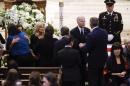 Family members of Beau Biden including his wife Hallie Biden, left, and parents Jill Biden and Vice President Joe Biden greet mourners at a viewing for the former Delaware Attorney General at St. Anthony of Padua in Wilmington Friday, June 5, 2015. Biden, the eldest son of Vice President Joe Biden, died of brain cancer Saturday at age 46. (William Bretzger/The Wilmington News-Journal via AP, Pool)