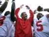Ohio State coach Urban Meyer, center, celebrates with quarterback Braxton Miller (5) and defensive back Corey Brown (3) following a 17-16 win over Michigan State in an NCAA college football game, Saturday, Sept. 29, 2012, in East Lansing, Mich. (AP Photo/Al Goldis)