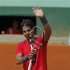 Nadal of Spain waves after winning his match against Istomin of Uzbekistan during the French Open tennis tournament at the Roland Garros stadium in Paris