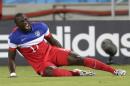United States' Jozy Altidore grimaces after pulling up injured during the group G World Cup soccer match between Ghana and the United States at the Arena das Dunas in Natal, Brazil, Monday, June 16, 2014. (AP Photo/Dolores Ochoa)