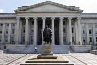 <p> FILE - In this Monday, Aug. 8, 2011 file photo, a statue of former Treasury Secretary Albert Gallatin stands outside the Treasury Building in Washington. The Treasury reports on the federal budget deficit for May, on Wednesday, June 12, 2013. (AP Photo/Jacquelyn Martin, File)