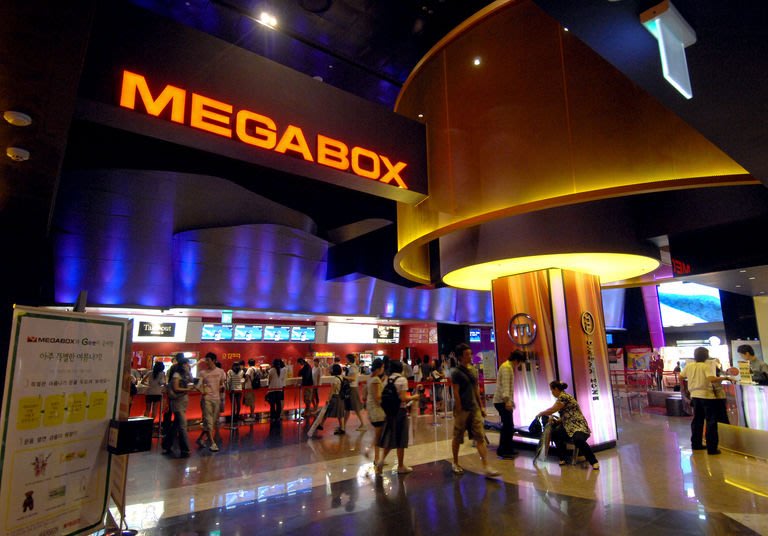 Movie-goers visit a Megabox cinema in Seoul on July 19, 2007