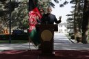 Afghanistan's President Karzai speaks during a news conference in Kabul