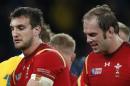 Wales' captain Sam Warburton, left, and Alun Wyn Jones leave the field after the Rugby World Cup Pool A match between Australia and Wales at Twickenham stadium in London, Saturday, Oct. 10, 2015. Australia won the match 15-6. (AP Photo/Alastair Grant)
