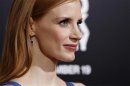 Cast member Jessica Chastain poses at the premiere of "Zero Dark Thirty" at the Dolby theatre in Hollywood