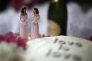 A wedding cake is seen at a reception for same-sex couples at The Abbey in West Hollywood