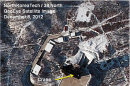 This Saturday Dec. 8, 2012 satellite image provided by GeoEye and annotated by 38 North, shows recent activity at the Sohae rocket launching facility in Cholsan County, North Pyongan Province, North Korea. An analysis written for 38 North, the website of the U.S.-Korean Institute at John Hopkins Advanced International Studies, predicted it's likely to take until Dec. 12-13 to remove the Unha-3 rocket and more than a week to repair it, meaning a launch is unlikely before Dec. 21-22. (AP Photo/GeoEye, 38 North, North Korea Tech)