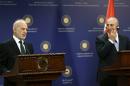 Turkish Foreign Minister Mevlut Cavusoglu (R) and his Iraqi counterpart Ibrahim al-Jaafari hold a joint press briefing at the Foreign Ministry in Ankara on July 14, 2015