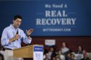 Republican Vice-Presidential candidate Paul Ryan gestures as he speaks to supporters during a campaign event in Derry