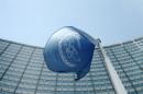 The flag of the IAEA flies in front of its headquarters in Vienna