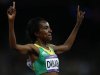 Ethiopia's Tirunesh Dibaba celebrates winning the women's 10000m final during the London 2012 Olympics Games at the Olympic Stadium