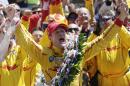 Ryan Hunter-Reay celebrates winning the 98th running of the Indianapolis 500 IndyCar auto race at the Indianapolis Motor Speedway in Indianapolis, Sunday, May 25, 2014. (AP Photo/AJ Mast)