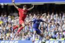 Liverpool's Steven Gerrard, left, competes for the ball with Chelsea's Eden Hazard during the English Premier League soccer match between Chelsea and Liverpool at Stamford Bridge, London, Sunday, May 10, 2015. (AP Photo/Tim Ireland)
