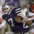 Kansas State quarterback Collin Klein (7) runs for a first down during the first half of an NCAA college football game against Oklahoma State in Manhattan, Kan., Saturday, Nov. 3, 2012. (AP Photo/Orlin Wagner)