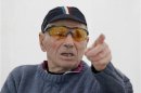 Robert Marchand , French centenarian, born November 26, 1911, and amateur cyclist, speaks to journalists at the outdoor Tete-d'Or Velodrome cycling track in Lyon