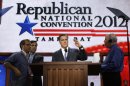 Republican presidential nominee Mitt Romney directs the placement of the teleprompter during a sound check at the Republican National Convention in Tampa, Fla., on Thursday, Aug. 30, 2012. (AP Photo/Charles Dharapak)