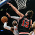 New York Knicks' Carmelo Anthony, left, attempts a shot as Chicago Bulls' Joakim Noah defends during the first quarter of an NBA basketball game Friday, Jan. 11, 2013, at Madison Square Garden in New York. (AP Photo/Bill Kostroun)