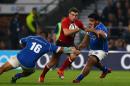 England's George Ford, centre, is challenged by Samoa's Manu Leiataua, left, during the friendly International Rugby match between England and Samoa, at the Twickenham Stadium, in London, Saturday Nov. 22, 2014. (AP Photo/PA, Gareth Fuller) UNITED KINGDOM OUT