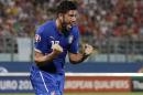 Italy's Graziano Pelle celebrates after scoring during the Euro 2016 qualifying soccer match between Malta and Italy, at the National Stadium Ta' Qali, in Valletta, Malta, Monday, Oct. 13, 2014. (AP Photo/Antonio Calanni)