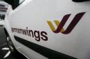A Germanwings logo is pictured at a door of a car outside the Germanwings headquarters at Cologne-Bonn airport