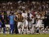 Brazil's Sao Paulo FC's players and Argentina's Tigre's players scuffle at the end of the first half of the Copa Sudamericana final soccer match in Sao Paulo, Brazil, Wednesday, Dec. 12, 2012. (AP Photo/Felipe Dana)