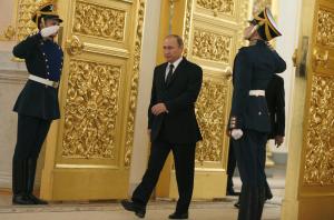 Russian PresidentVladimir Putin, center, enters a hall &hellip;
