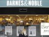 A woman looks in from a window panel of a Barnes and Noble store in New York