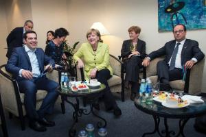 German Chancellor Angela Merkel (C), Greek Prime Minister …