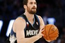 Minnesota Timberwolves' Kevin Love shoots during the NBA All-Star Three-Point Shootout basketball competition in Orlando, Fla., Saturday, Feb. 25, 2012. (AP Photo/Lynne Sladky)