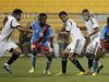RD Congo's Angani Kayiba (R) controls the ball past Egypt's Ashur Al Takki (2nd R) during their friendly soccer match in Doha