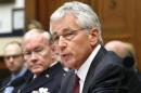 U.S. Secretary of Defense Chuck Hagel and Chairman of the Joint Chiefs of Staff U.S. Army General Martin Dempsey testify before the House Armed Services Committee hearing on on Capitol Hill in Washington