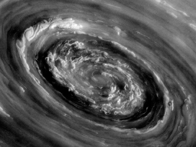 Roiling storm clouds and a swirling vortex at the center of Saturn's famed north polar hexagon is seen in an image from NASA's Cassini mission taken November 27, 2012. The camera was pointing toward Saturn from approximately 224,618 miles (361,488 kilometers) away.  REUTERS/NASA/JPL-Caltech/Space Science Institute/Handout  (UNITED STATES - Tags: SCIENCE TECHNOLOGY) THIS IMAGE HAS BEEN SUPPLIED BY A THIRD PARTY. IT IS DISTRIBUTED, EXACTLY AS RECEIVED BY REUTERS, AS A SERVICE TO CLIENTS. FOR EDITORIAL USE ONLY. NOT FOR SALE FOR MARKETING OR ADVERTISING CAMPAIGNS