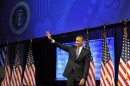U.S. President Barack Obama waves to guests as he leaves the stage after speaking at the Planned Parenthood National Conference at the Marriott Wardman Park Hotel in Washington