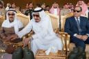 In this Thursday March 10, 2016 photo released by the Saudi Press Agency, SPA, Saudi King Salman, middle, watches military exercises code named North Thunder with Egyptian President Abdel Fattah el-Sisi, right, and the Emir of Kuwait Sheikh Sabah Al-Ahmad Al-Jaber Al-Sabah, left, in Hafr Al-Baten, Saudi Arabia. (Saudi Press Agency via AP)